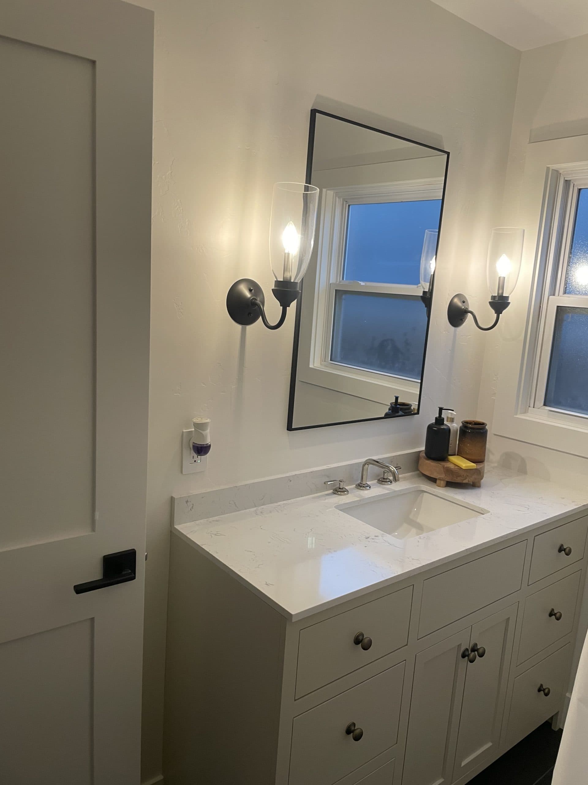 Updated bathroom with tile shower and window Carmichael renovation