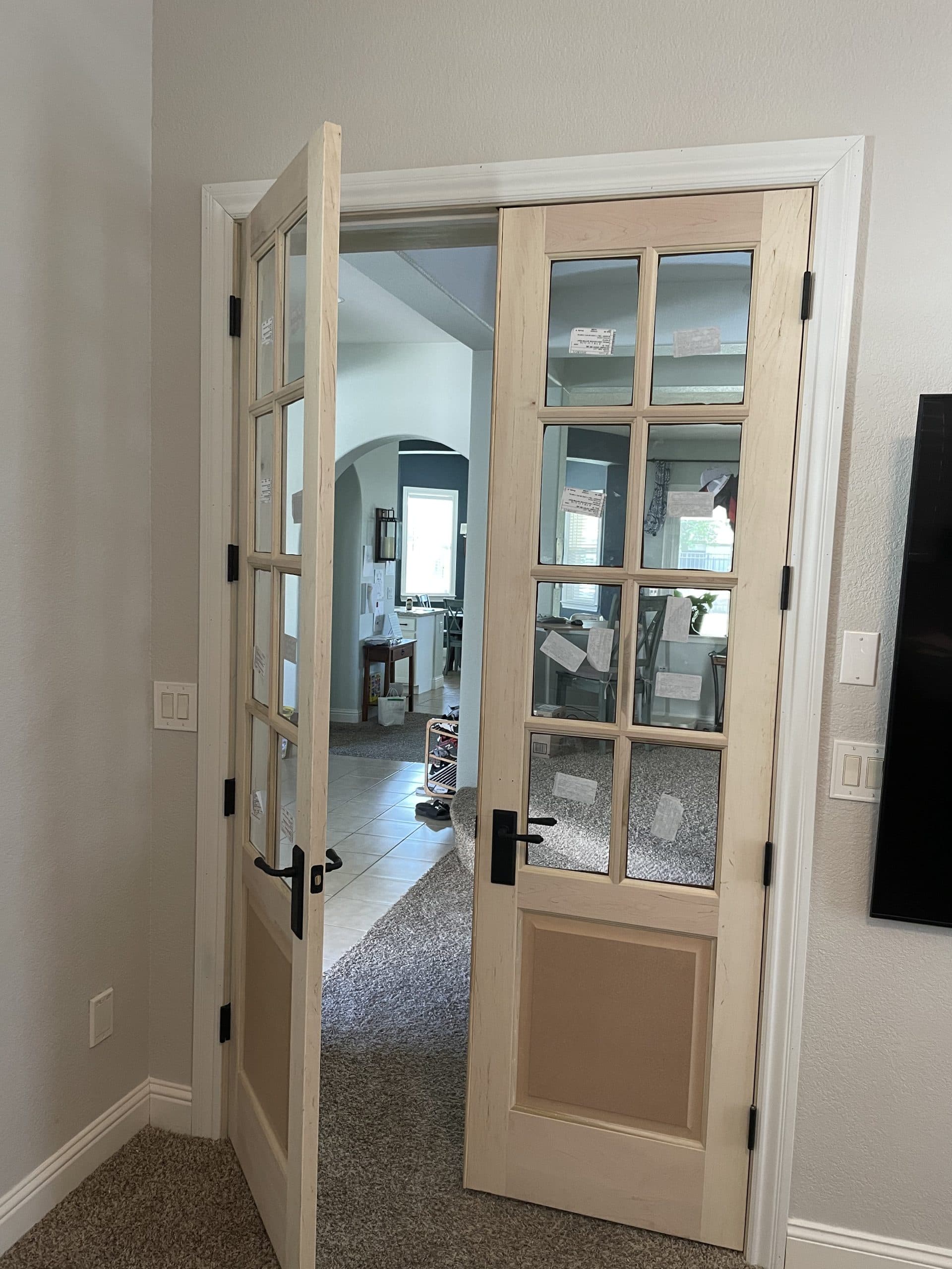 Custom entryway with stained doors Sacramento renovation