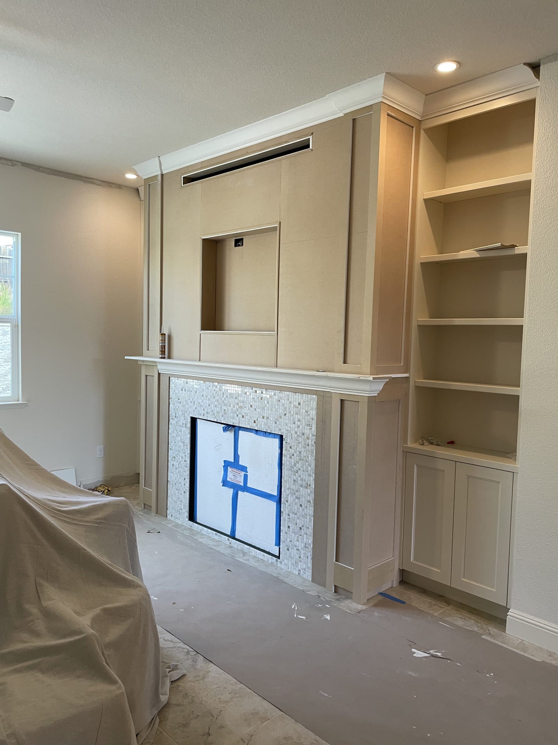 Carmichael fireplace remodel with custom surround and mantel