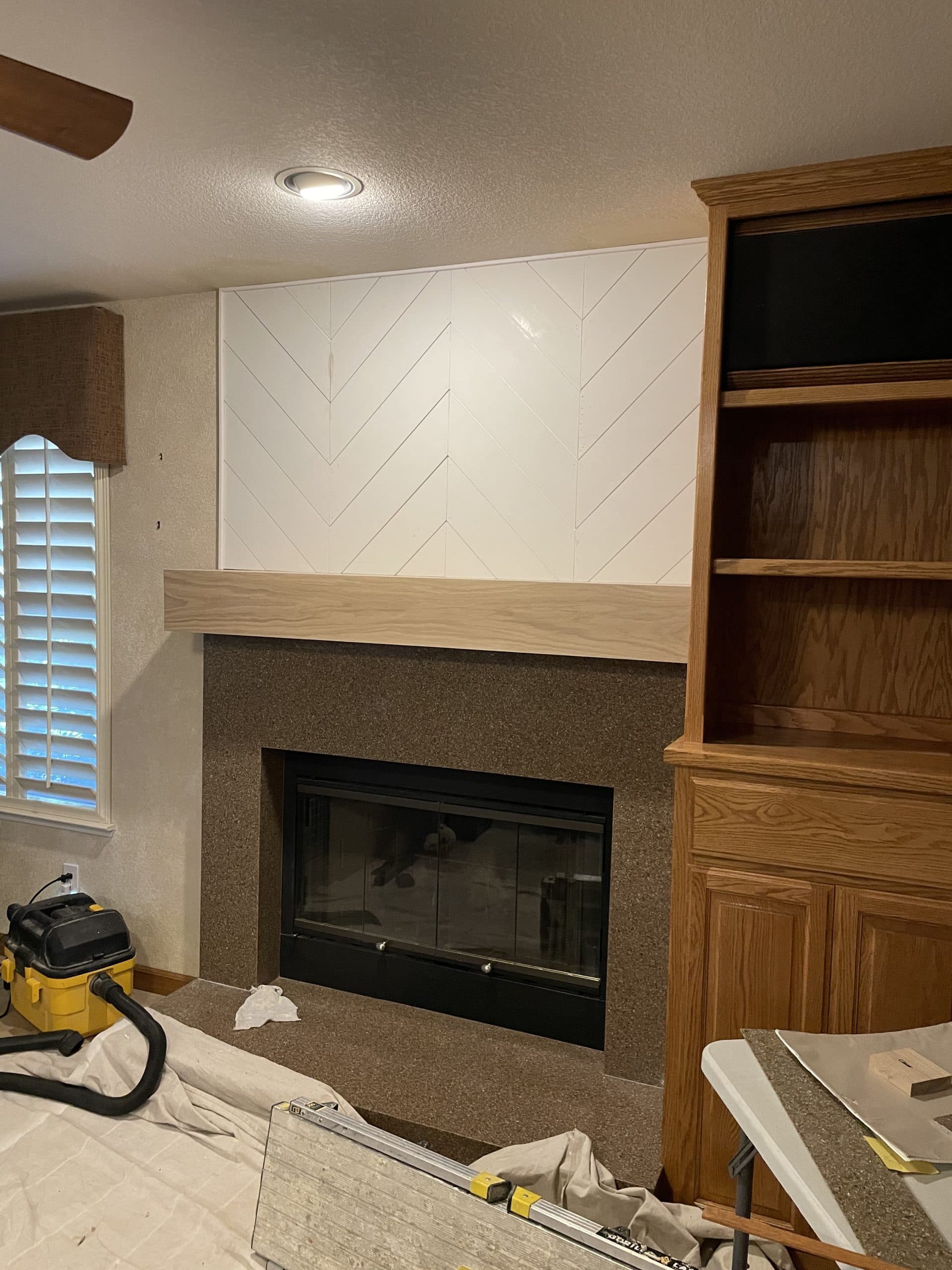 Custom fireplace build with mantel and surround Carmichael