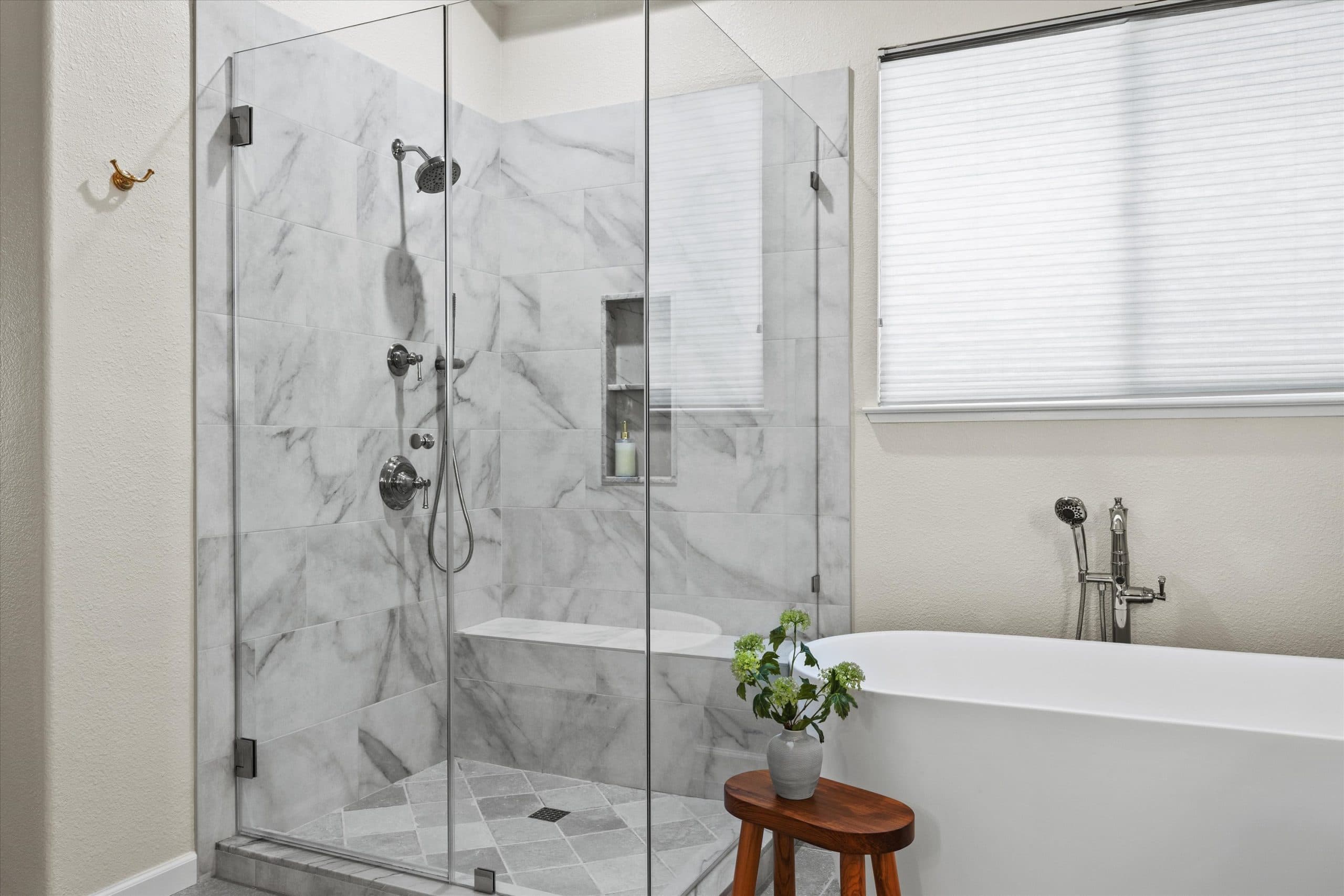 El Macero Estates master bathroom remodel with custom tile shower and freestanding tub by Parrish Construction